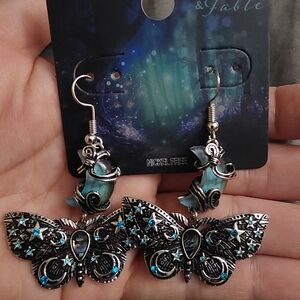 Elegant Silver and Blue Moth Earrings with Intricate Detailing